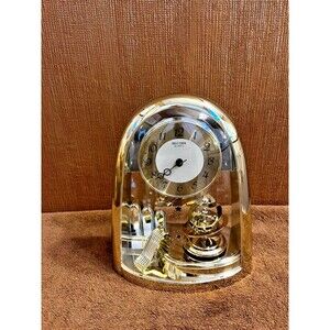 VTG Rhythm Gold Rotating Pendulum Space Mantel Clock 4SG607 Stars Celestial-read